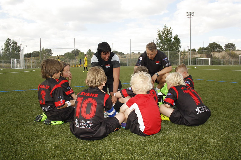 Youth soccer team huddle
